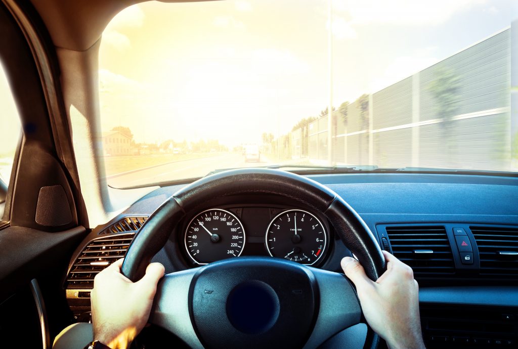 Driving a car on a sunny day